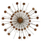 A Large Starburst Wall Hanging, attributed to William Bowie.