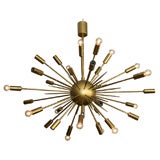 An Italian Stilnovo Starburst Chandelier.