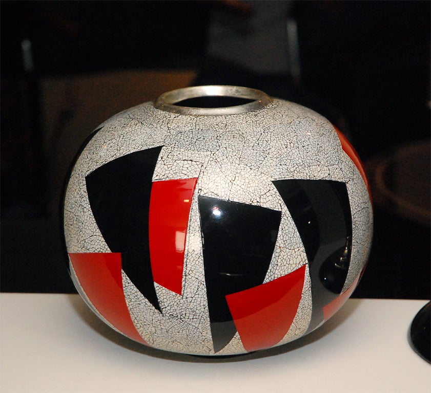 beautiful round vase in the style of jean dunand