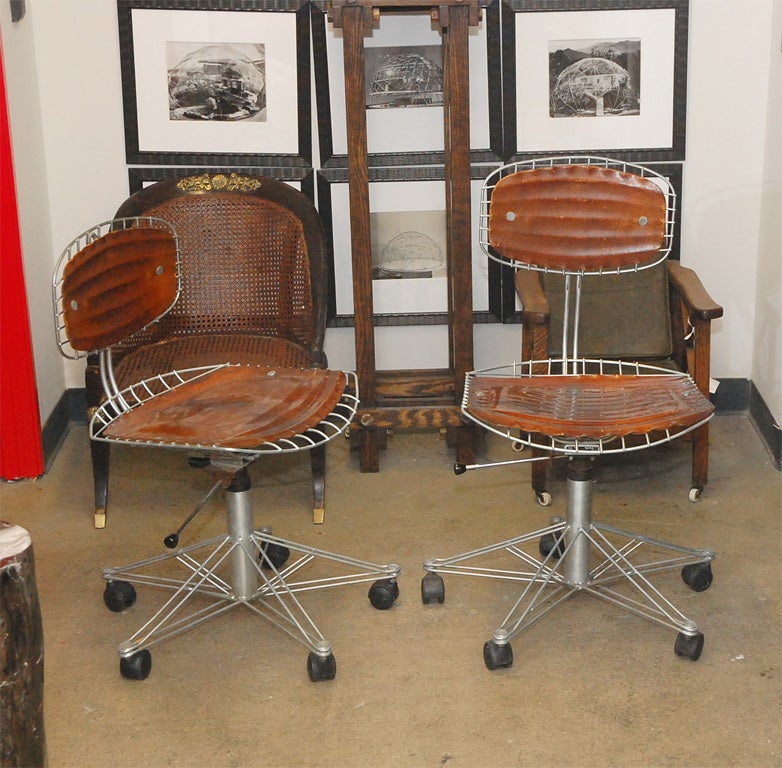 Pair of desk chairs by Michel Cadestin and Georges Laurent