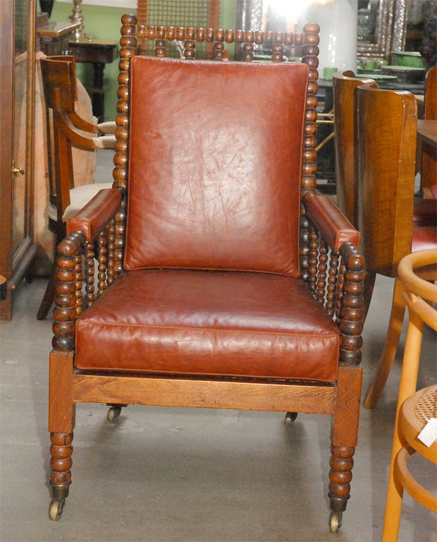 Bobbing turned English rosewood armchair with cane seat, 19th century