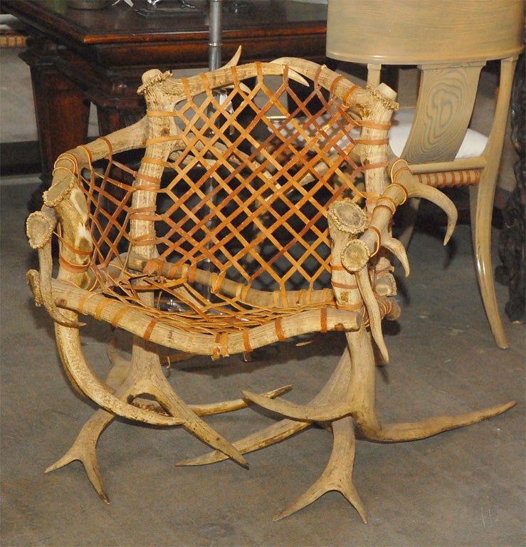 Antler armchairs with leather strappings In Good Condition For Sale In Los Angeles, CA