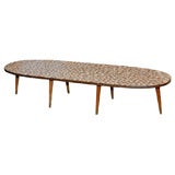 Oval mosaic tile top coffee table