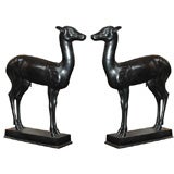 Pair of bronze patinated figures of Lambs