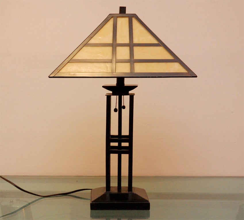 SINGLE METAL AND GLASS TABLE LAMP, IN THE ARTS & CRAFTS STYLE.