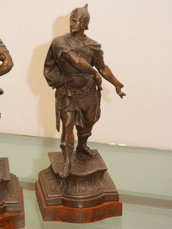 Italian PAIR OF PATINATED SPELTER FIGURES OF WARRIORS
