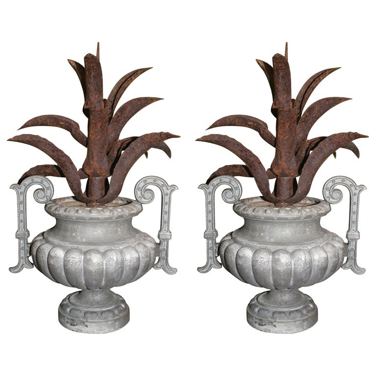 Pair of Cast Iron Urns For Sale