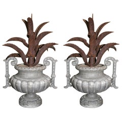 Pair of Cast Iron Urns