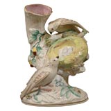Staffordshire figure of birds and nest with eggs