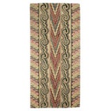 Antique Hooked Rug: Geometric Angles and Curves.