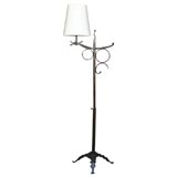An Art Deco patinated wrought iron Sweedish Floor Lamp