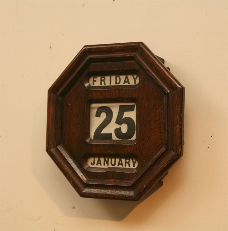 This Perpetual wall calendar was used by English bankers and sat next to their desk, on the wall. Each day,date and month moves. This piece would be perfect in an office or a country kitchen. Stunning patina .