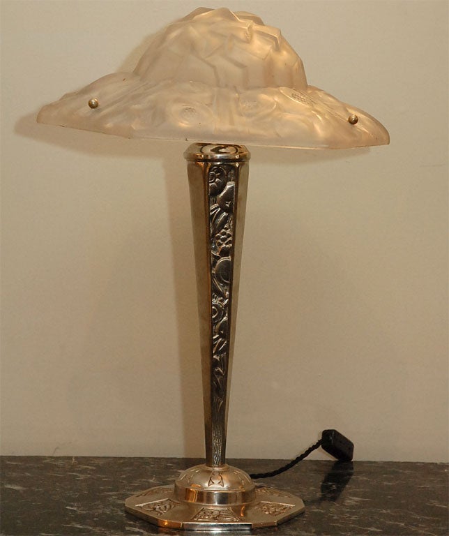 Beautiful Pair of Table lamps. Art glass shades signed by Degue.
Original Bases with floral relief motif.