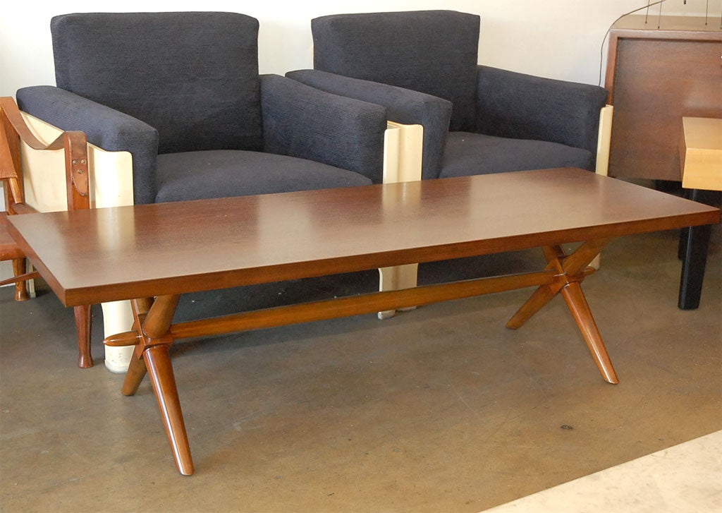 Traditional and elegant coffee table by Robsjohn Gibbings.