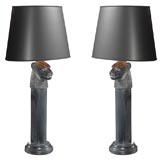 Pair of Ebonized Lion's Head Lamps