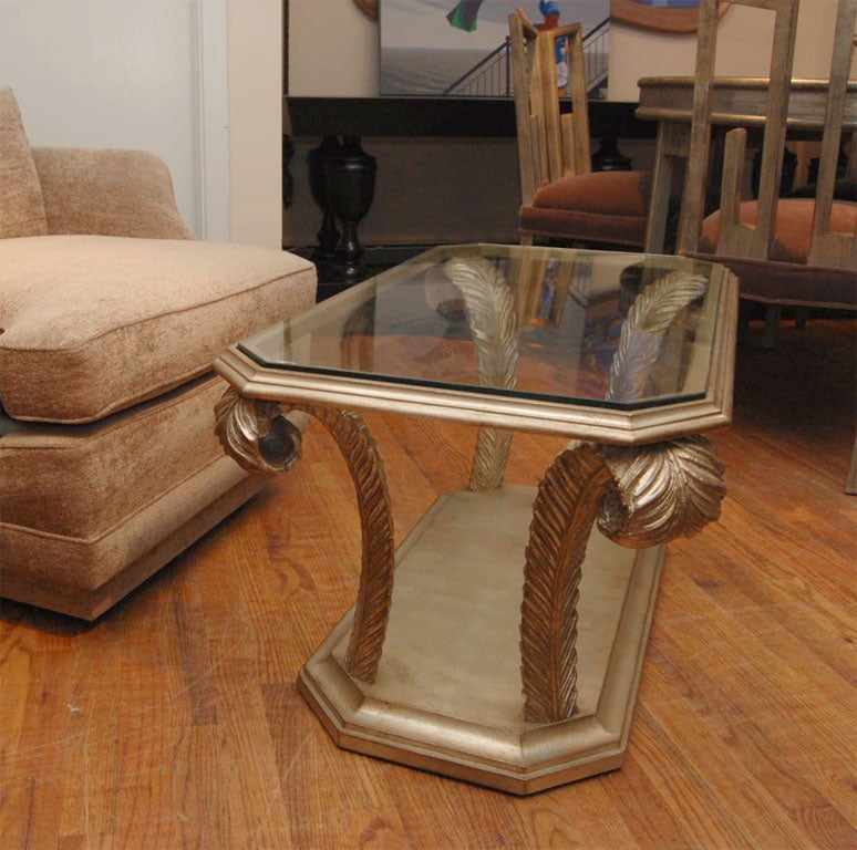 Beautiful octagonal Prince of Wales table with wonderful carved plumes which has an applied glazed leaf finish and inset glass top.