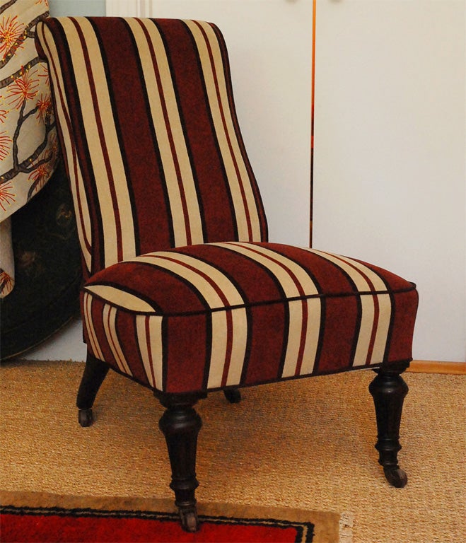 Slipper chair with great pitch. Recently restored and upholstered in Peter Dunham 