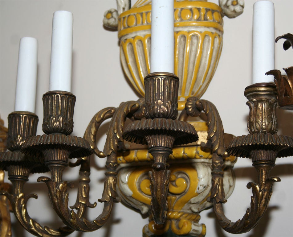 American Set of four Caldwell enameled sconces