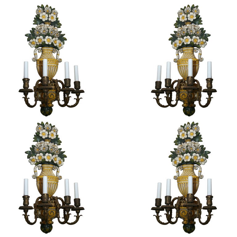 Set of four Caldwell enameled sconces
