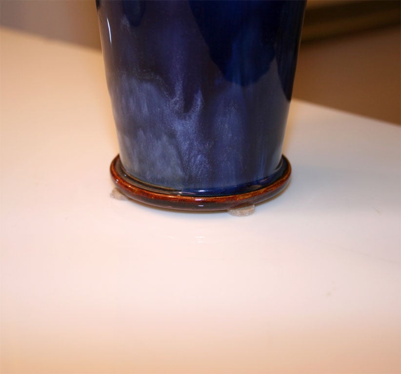 Art Nouveau style glazed ceramic vases with fruit and leaf motif. Bottom half is glazed in blue. Priced individually.