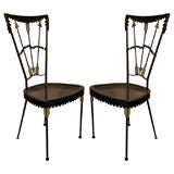 Pair of metal chairs in the style of Tomasso Buzzi