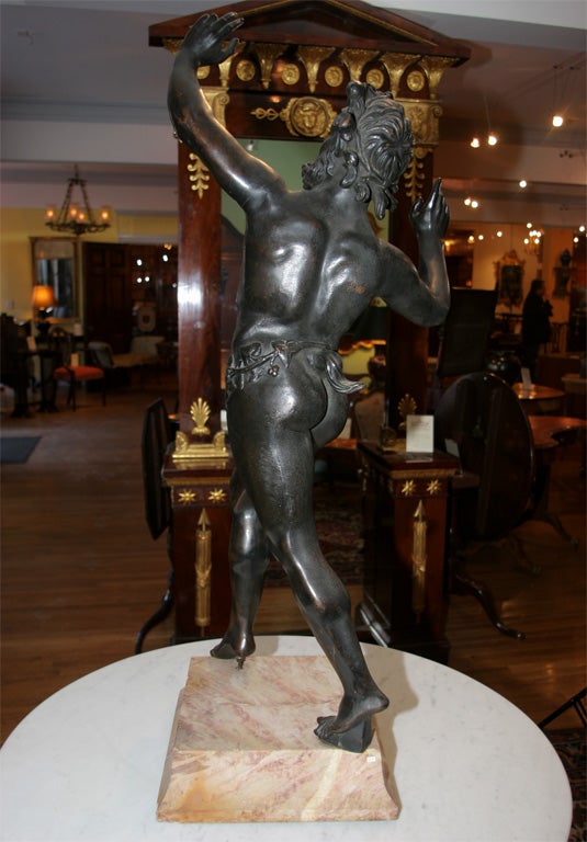 Large Italian Grand Tour bronze sculpture of a dancing faun on a marble plinth, after the antique