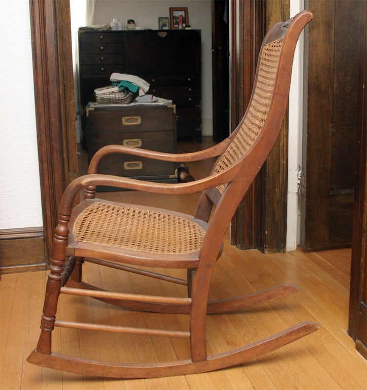 American Late 19th century hand caned rocking chair For Sale