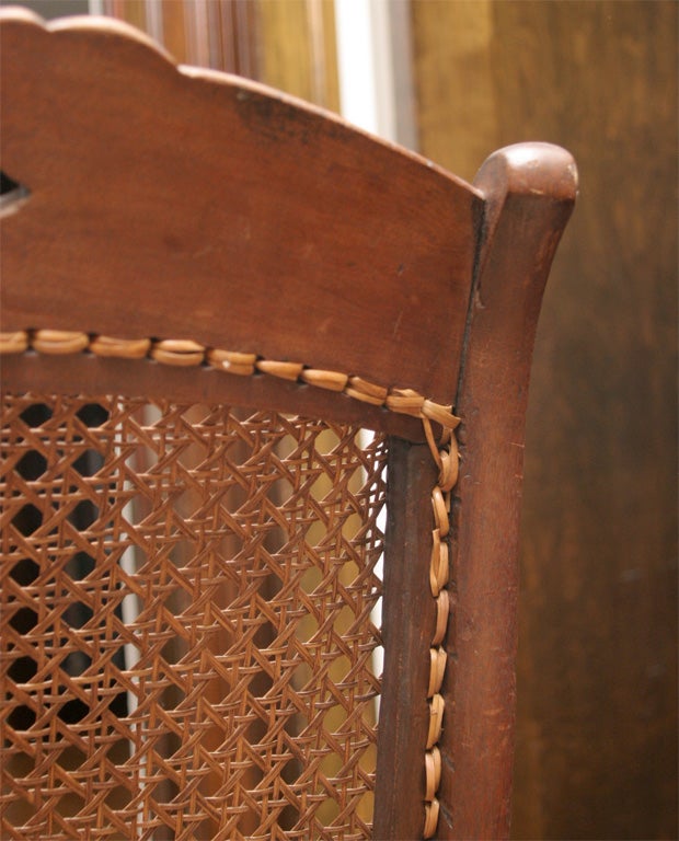 Wood Late 19th century hand caned rocking chair For Sale