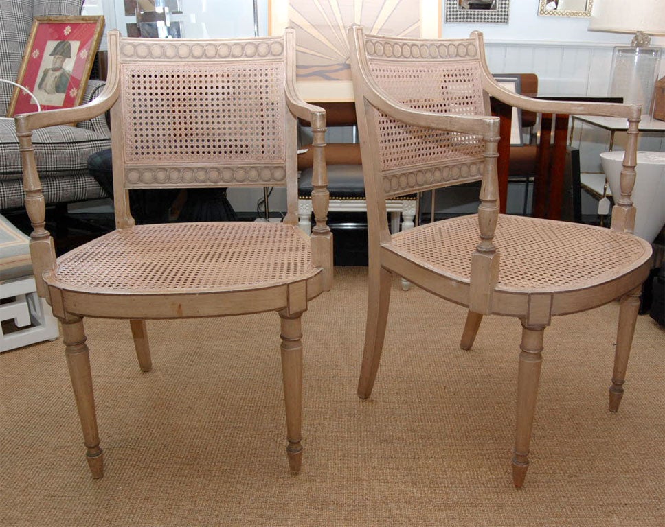 Pair of Italian painted wood frame and cane armchairs