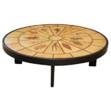 Oval tile top coffee table by Roger Capron