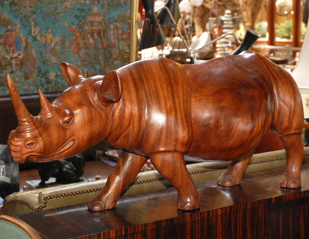 Large carved rainwood rhino