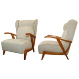 Pair of suede upholstered wood frame arm chairs Pair of suede upholstered wood frame arm chairs