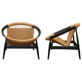 Pair of ebonized wood woven seat chairs.