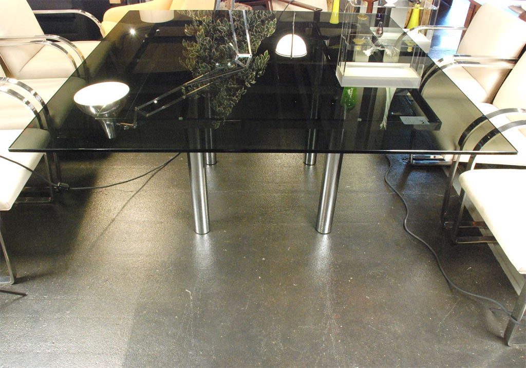 This glass table table seats 8 comfortably.