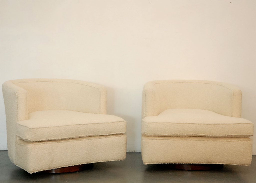 Drexel Swivel Chairs. Redone in white wool boucle and medium walnut base.