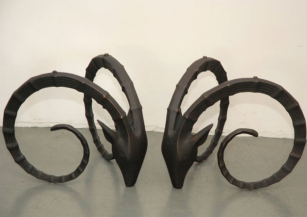 Solid Cast Rams Heads in Oil Rubbed Bronze. Solid and Well Made. Priced without Glass.