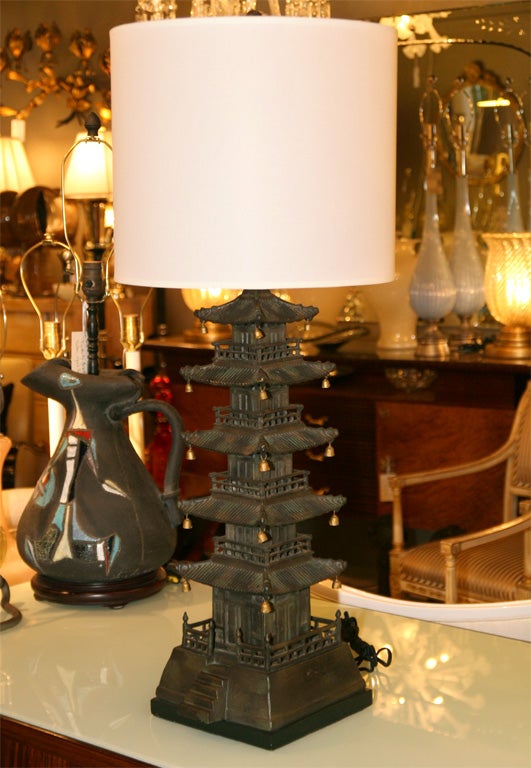 Exceptional cast bronze Pagoda lamp with fantastic aged patina and gilded iron accents. Visit QUOTIENTNYC.com to view our entire collection.
