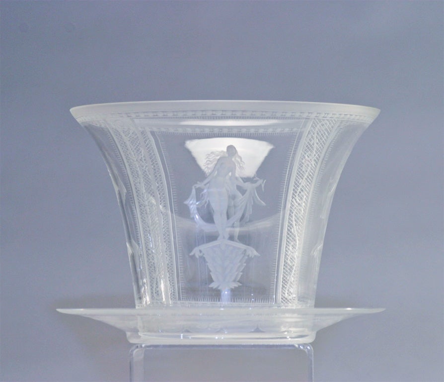Signed Orrefors hand blown crystal ice bucket or centerpiece with underplate featuring engraved Art Deco nudes. Bowl measures 5.75