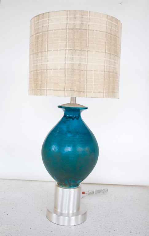 Beautiful Herman Kahler ceramic, turned into a lamp by Paul Laszlo for the Corolla George estate in Los Angeles, with silver plated fittings. A new custom lampshade in the spirit of the original has been created. 

This lamp has been recently