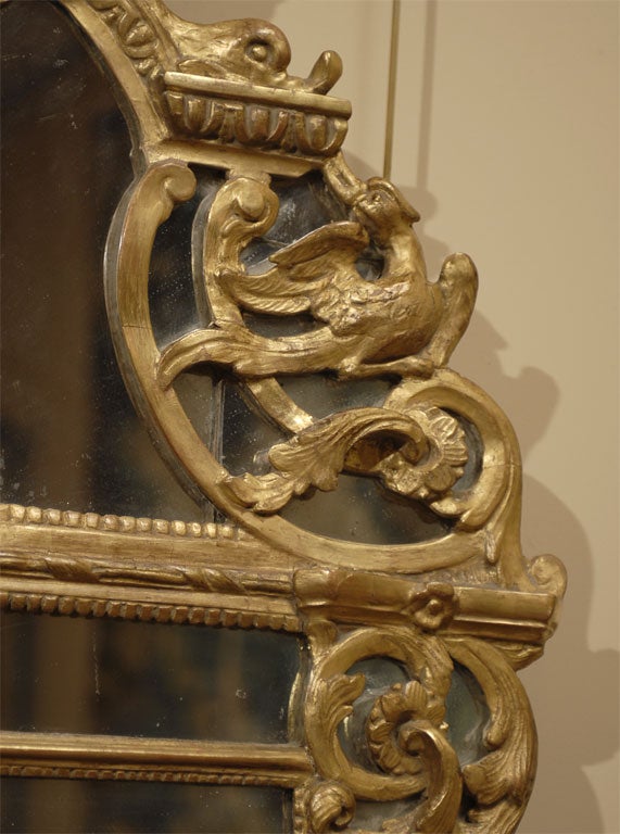 Regence style Gilt-wood Mirror with Trophic Crest, c. 1760 1