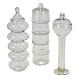 Three clear glass Apothecary Jars