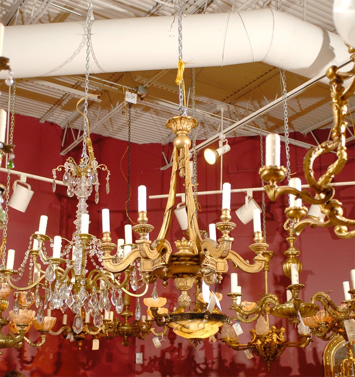 Elegant Antique giltwood chandelier with six arms.
