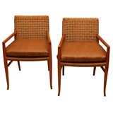 Pair of 1950's arm chairs with cane backs and leather seats