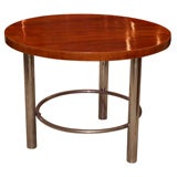 Circular walnut top table on chrome base