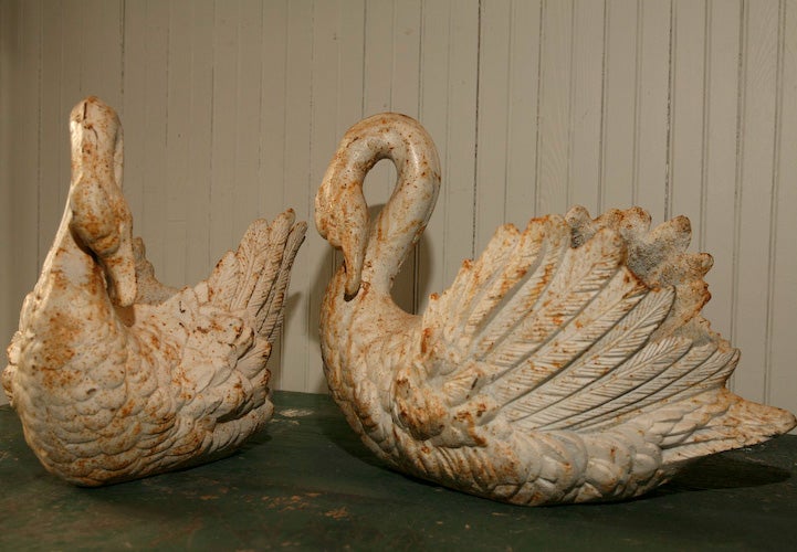 Beautifully Casted Life-Sized Garden Swans. Original Paint and Surface. The Swans Function as Planters as well as Garden Sculptures