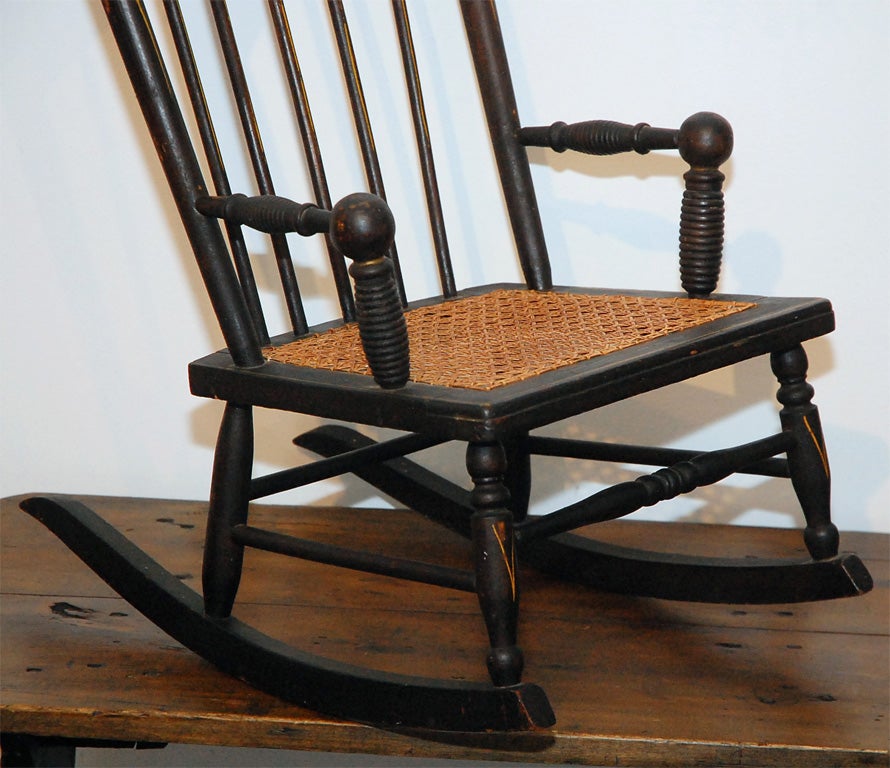 American 19THC ORIGINAL BLACK PAINTED AND DECORATED CHILD'S ROCKING CHAIR