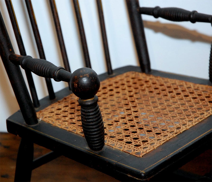 19THC ORIGINAL BLACK PAINTED AND DECORATED CHILD'S ROCKING CHAIR 1