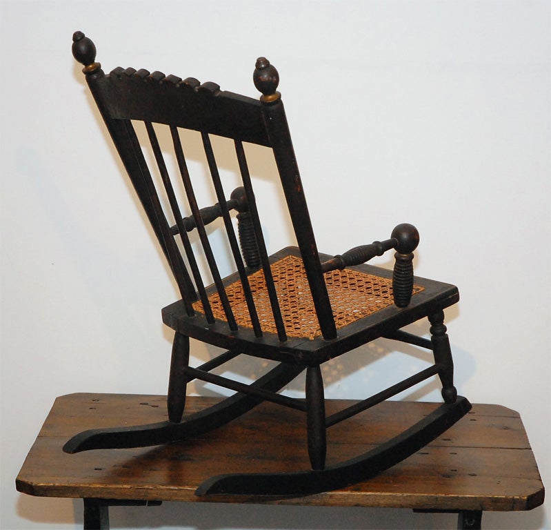 19THC ORIGINAL BLACK PAINTED AND DECORATED CHILD'S ROCKING CHAIR 3