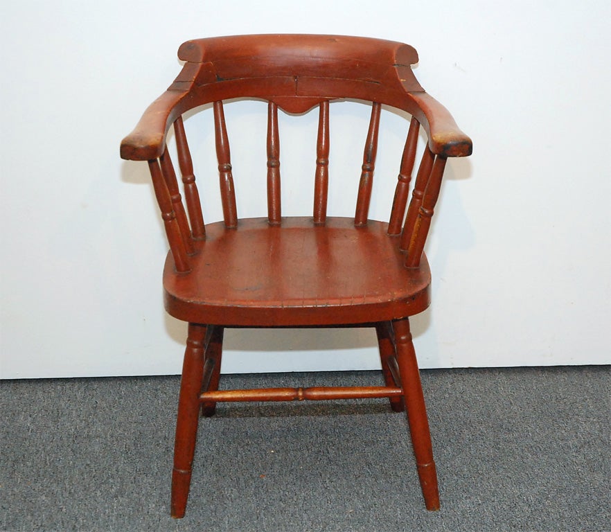 EARLY 19THC ALL ORIGINAL CAPTAIN CHAIR IN A WONDERFUL PATINA. THIS CHAIR CAME FROM NEW ENGLAND AND HAS ITS OLD ORIGINAL SURFACE. GREAT CONDITION.