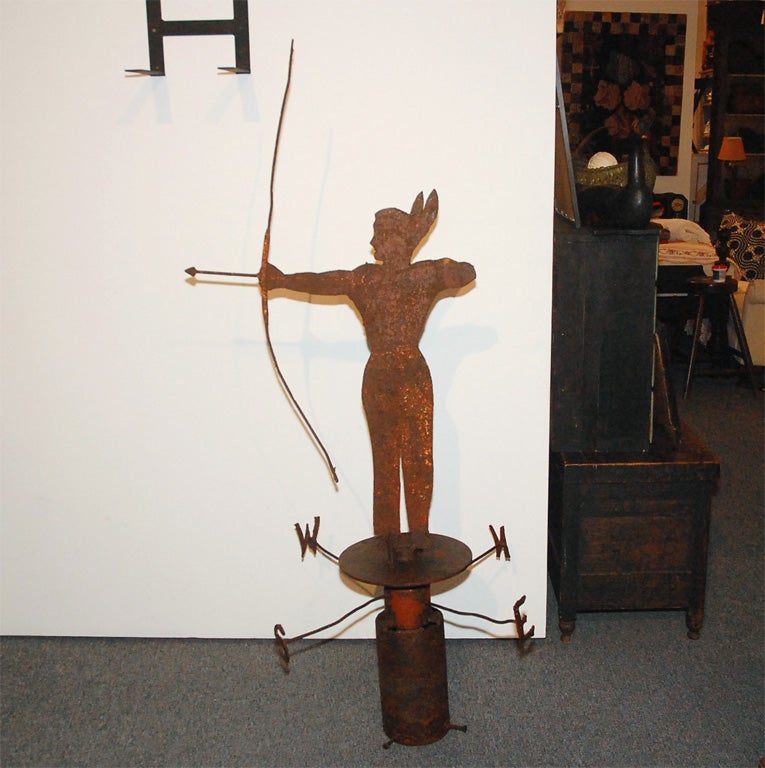 Fantastic and rare original painted surface iron Indian weather vane, worn painted surface. Great original Directional's in iron and attached. This Indian weather vane was found in the Midwest and was removed from 19th century farmhouse. The patina